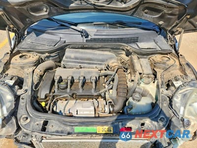 Zdjęcie 11 z 13 samochodu: 2010 MINI COOPER S VIN:WMWMF7C5XATZ69351 - miniatura