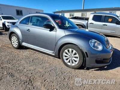 Czwarte zdjęcie samochodu z boku: 2013 VOLKSWAGEN BEETLE VIN:3VWFP7AT6DM653553 - miniatura