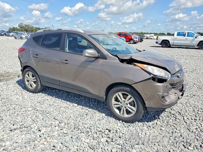 Czwarte zdjęcie samochodu z boku: 2011 HYUNDAI TUCSON GLS VIN:KM8JUCAC0BU226436 - miniatura