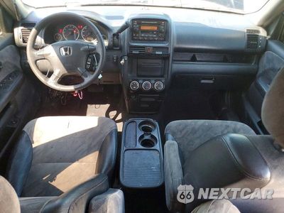 Zdjęcie 15 z 28 samochodu: 2004 HONDA CR-V EX VIN:SHSRD78804U211617 - miniatura