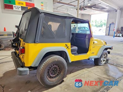 Trzecie zdjęcie samochodu z tyłu: 2002 JEEP WRANGLER / TJ SPORT VIN:1J4FA49S12P763846 - miniatura