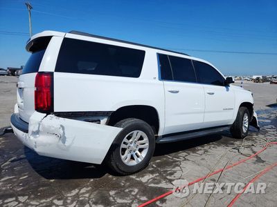 Trzecie zdjęcie samochodu z tyłu: 2020 CHEVROLET SUBURBAN K1500 LT VIN:1GNSKHKC2LR257791 - miniatura