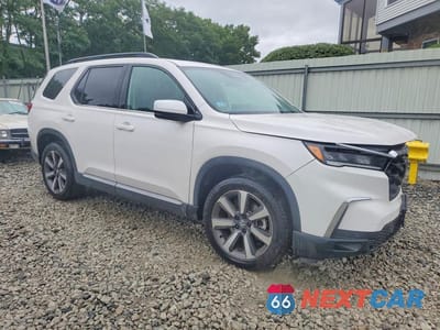 Czwarte zdjęcie samochodu z boku: 2025 HONDA PILOT TOURING VIN:5FNYG1H78SB120347 - miniatura