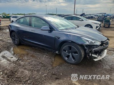 Czwarte zdjęcie samochodu z boku: 2021 TESLA MODEL 3 VIN:5YJ3E1EB5MF990391 - miniatura