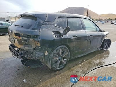 Trzecie zdjęcie samochodu z tyłu: 2024 BMW IX XDRIVE50 VIN:WB523CF04RCN52035 - miniatura