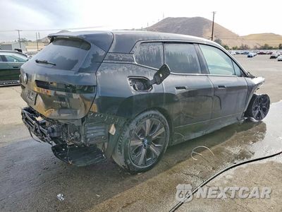 Trzecie zdjęcie samochodu z tyłu: 2024 BMW IX XDRIVE50 VIN:WB523CF04RCN52035 - miniatura