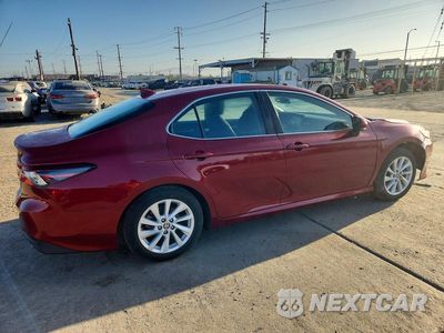 Trzecie zdjęcie samochodu z tyłu: 2022 TOYOTA CAMRY LE VIN:4T1R11AK1NU071021 - miniatura