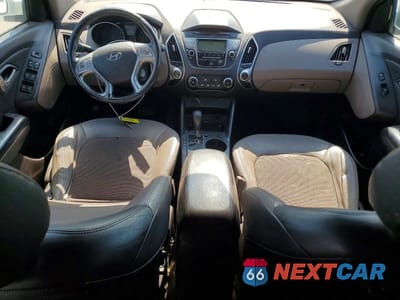Zdjęcie 8 z 13 samochodu: 2010 HYUNDAI TUCSON GLS VIN:KM8JU3AC9AU096395 - miniatura