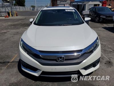 Piąte zdjęcie samochodu w środku: 2018 HONDA CIVIC TOURING VIN:JHMFC1F9XJX036380 - miniatura