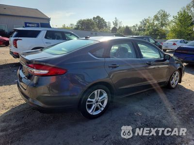 Trzecie zdjęcie samochodu z tyłu: 2018 FORD FUSION SE VIN:3FA6P0H78JR129280 - miniatura