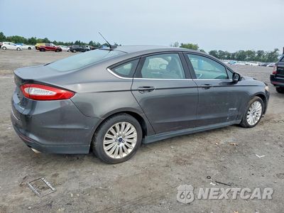 Trzecie zdjęcie samochodu z tyłu: 2016 FORD FUSION S HYBRID VIN:3FA6P0UU7GR205642 - miniatura