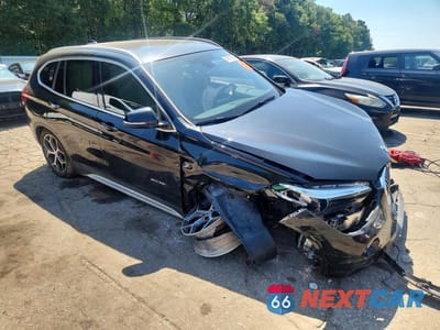 Czwarte zdjęcie samochodu z boku: 2017 BMW X1 XDRIVE28I VIN:WBXHT3C31H5F74886 - miniatura