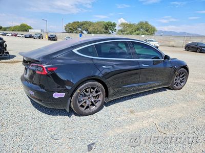 Trzecie zdjęcie samochodu z tyłu: 2018 TESLA MODEL 3 VIN:5YJ3E1EA9JF172634 - miniatura