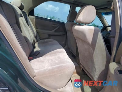 Zdjęcie 11 z 13 samochodu: 1999 TOYOTA CAMRY LE VIN:JT2BG22K7X0294174 - miniatura