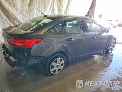 Trzecie zdjęcie samochodu z tyłu: 2017 FORD FOCUS S VIN:1FADP3E22HL256116 - miniatura