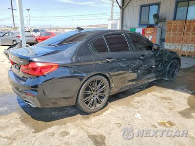 Trzecie zdjęcie samochodu z tyłu: 2018 BMW 530 XI VIN:WBAJA7C5XJG907720 - miniatura