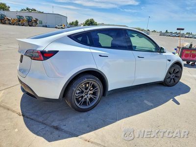 Trzecie zdjęcie samochodu z tyłu: 2024 TESLA MODEL Y VIN:7SAYGDED7RF154403 - miniatura