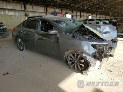 Czwarte zdjęcie samochodu z boku: 2017 NISSAN ALTIMA 2.5 SV VIN:1N4AL3AP2HC293148 - miniatura