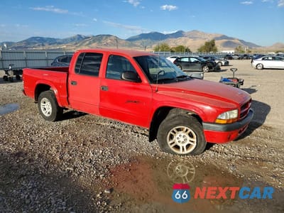 Czwarte zdjęcie samochodu z boku: 2003 DODGE DAKOTA QUAD SPORT VIN:1D7HL38XX3S126345 - miniatura