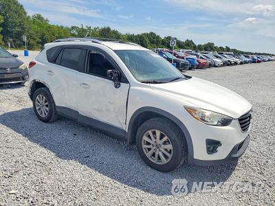 Czwarte zdjęcie samochodu z boku: 2016 MAZDA CX-5 TOURING VIN:JM3KE2CY5G0683662 - miniatura