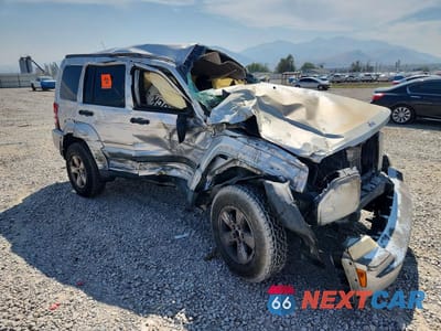 Czwarte zdjęcie samochodu z boku: 2011 JEEP LIBERTY SPORT VIN:1J4PN2GK9BW553260 - miniatura