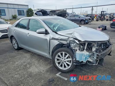 Czwarte zdjęcie samochodu z boku: 2012 TOYOTA CAMRY HYBRID XLE VIN:4T1BD1FK3CU051223 - miniatura