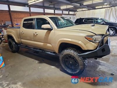 Czwarte zdjęcie samochodu z boku: 2016 TOYOTA TACOMA TRD SPORT VIN:5TFDZ5BN2GX011211 - miniatura