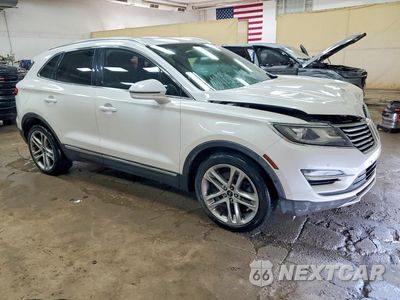 Czwarte zdjęcie samochodu z boku: 2015 LINCOLN MKC VIN:5LMCJ2A98FUJ35319 - miniatura