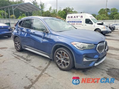Czwarte zdjęcie samochodu z boku: 2021 BMW X1 SDRIVE28I VIN:WBXJG7C00M5T71465 - miniatura