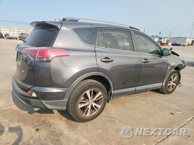 Trzecie zdjęcie samochodu z tyłu: 2018 TOYOTA RAV4 XLE VIN:JTMWFREV5JD120677 - miniatura