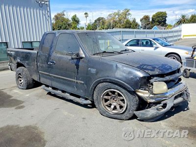 Czwarte zdjęcie samochodu z boku: 2001 FORD F150 VIN:1FTRX18L21NB73093 - miniatura