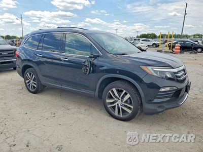 Czwarte zdjęcie samochodu z boku: 2017 HONDA PILOT TOURING VIN:5FNYF6H91HB029706 - miniatura