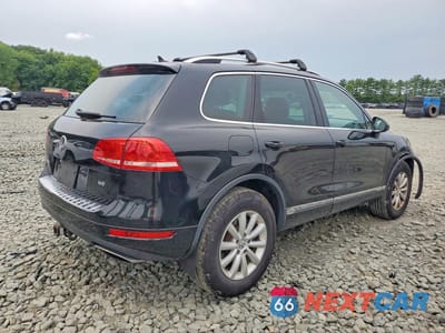 Trzecie zdjęcie samochodu z tyłu: 2011 VOLKSWAGEN TOUAREG V6 VIN:WVGFF9BP8BD001072 - miniatura