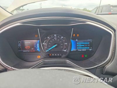 Zdjęcie 9 z 12 samochodu: 2017 FORD FUSION SE HYBRID VIN:3FA6P0LUXHR301087 - miniatura