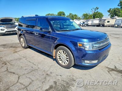 Czwarte zdjęcie samochodu z boku: 2017 FORD FLEX SEL VIN:2FMGK5C89HBA02083 - miniatura
