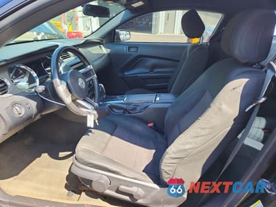 Zdjęcie 7 z 12 samochodu: 2013 FORD MUSTANG VIN:1ZVBP8AM9D5277577 - miniatura