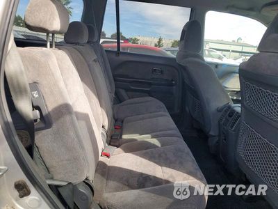 Zdjęcie 21 z 26 samochodu: 2004 HONDA PILOT EX VIN:2HKYF18484H523483 - miniatura