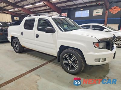 Czwarte zdjęcie samochodu z boku: 2014 HONDA RIDGELINE SPORT VIN:5FPYK1F77EB009706 - miniatura
