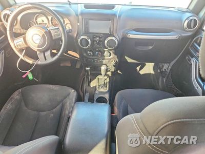Zdjęcie 8 z 13 samochodu: 2017 JEEP WRANGLER UNLIMITED SAHARA VIN:1C4HJWEGXHL677379 - miniatura