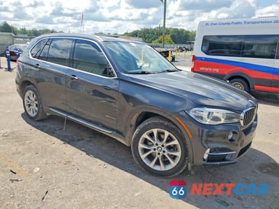 Czwarte zdjęcie samochodu z boku: 2014 BMW X5 SDRIVE35I VIN:5UXKR2C55E0H34045 - miniatura