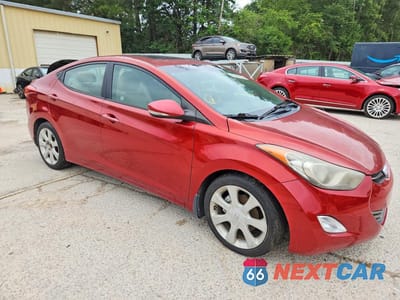 Czwarte zdjęcie samochodu z boku: 2012 HYUNDAI ELANTRA LIMITED VIN:KMHDH4AE7CU342601 - miniatura