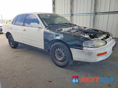 Czwarte zdjęcie samochodu z boku: 1995 TOYOTA CAMRY LE VIN:4T1SK12E8SU478725 - miniatura