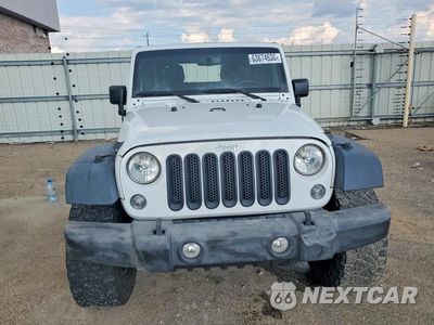 Piąte zdjęcie samochodu w środku: 2016 JEEP WRANGLER UNLIMITED SPORT VIN:1C4BJWDG8GL328114 - miniatura