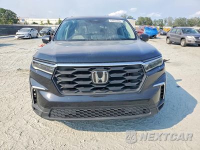 Piąte zdjęcie samochodu w środku: 2024 HONDA PILOT LX VIN:5FNYG2H26RB007047 - miniatura