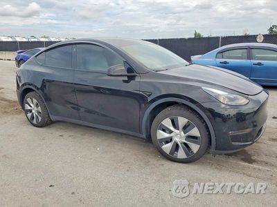 Czwarte zdjęcie samochodu z boku: 2023 TESLA MODEL Y VIN:7SAYGDEE3PF880944 - miniatura