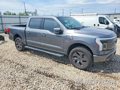 Czwarte zdjęcie samochodu z boku: 2022 FORD F150 LIGHTNING PRO VIN:1FT6W1EV7NWG03440 - miniatura