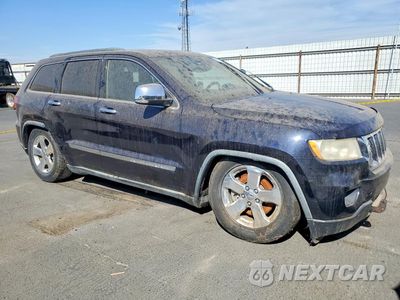 Czwarte zdjęcie samochodu z boku: 2011 JEEP GRAND CHEROKEE OVERLAND VIN:1J4RR6GT2BC647673 - miniatura
