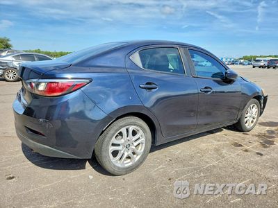 Trzecie zdjęcie samochodu z tyłu: 2017 TOYOTA YARIS IA BASE VIN:3MYDLBYV9HY147201 - miniatura