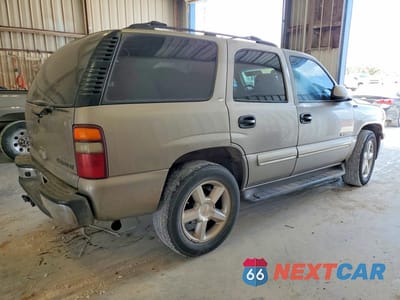 Trzecie zdjęcie samochodu z tyłu: 2001 CHEVROLET TAHOE C1500 VIN:1GNEC13T41J139026 - miniatura