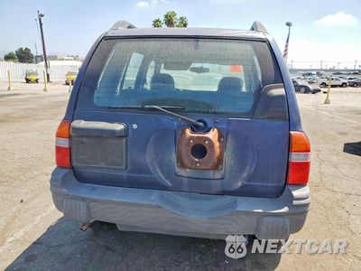 Zdjęcie 6 z 13 samochodu: 2000 CHEVROLET TRACKER VIN:2CNBE13C4Y6905118 - miniatura